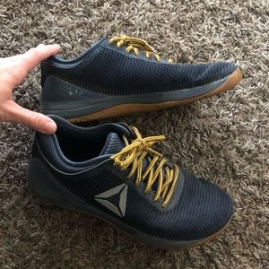 Size 9.5 Navy and Gold Reebok Nano